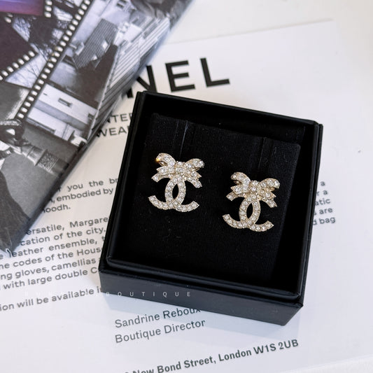 CHANEL CC Rhinestone Bow Earrings